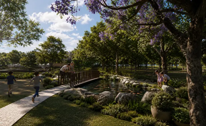 Children running past the koi pond and its footbridge